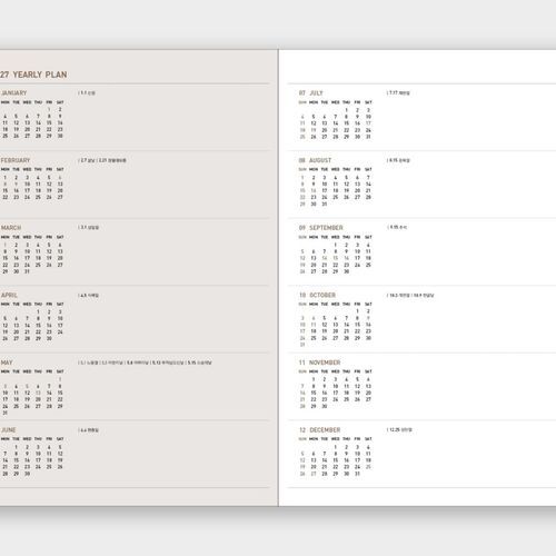 The open monthly layout shows dated boxes arranged across the spread with small calendar references for nearby months.