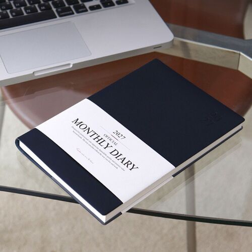 A Deep Forest scheduler stands prominently in front of other color choices in the collection.