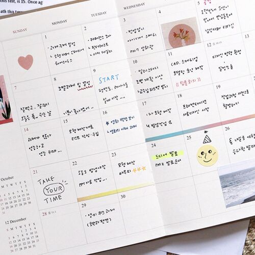 An April weekly layout is shown in use with handwritten notes and a few colorful marks.