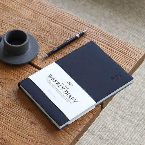 Lined pages provide room for longer reflections, lists, references, or notes beyond the weekly schedule.