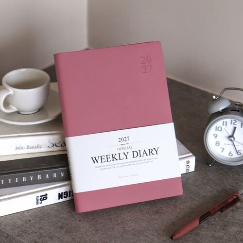 A decorated journal spread pairs handwritten reflections with photographs, tape, and small paper accents.