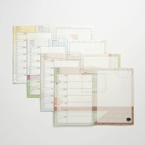 Multiple Lana & Tuxedo Cat spreads reveal varied cat-themed backgrounds paired with the same practical weekly structure.