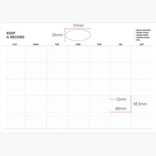 The calendar stands on a white workstation beside a keyboard, mouse, notebook, and writing hand.