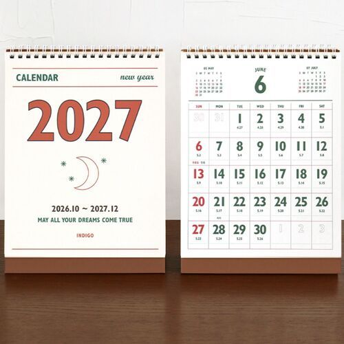 Two views show the calendar standing open on a brown base, with the 2027 cover and a monthly grid visible.