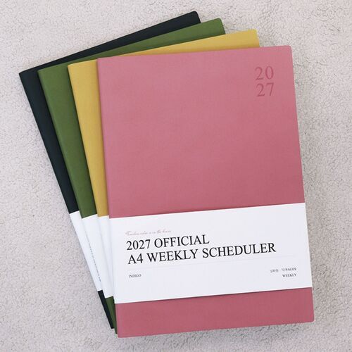 A yearly plan spread presents all twelve months in a broad horizontal overview for long-range scheduling.