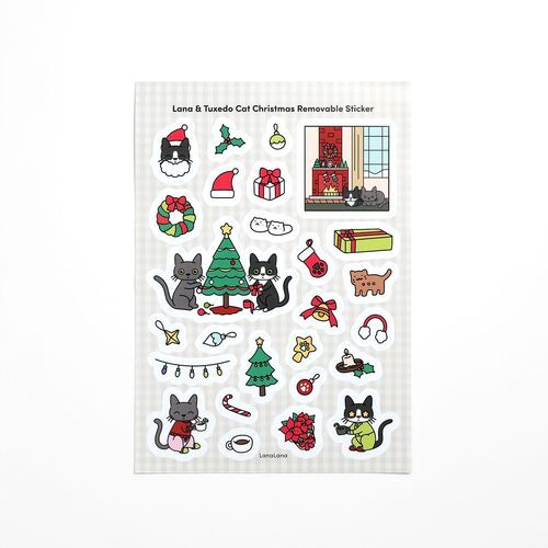 The removable sheet is shown with a pale checkered background and a detailed mix of Christmas cat designs.