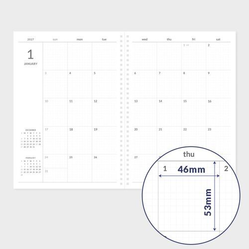 A Navy planner and White planner overlap in a flat-lay arrangement, showing their consistent spiral-bound construction.