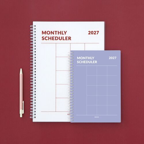 A two-page yearly plan layout provides numbered sections for organizing broader goals across the calendar year.