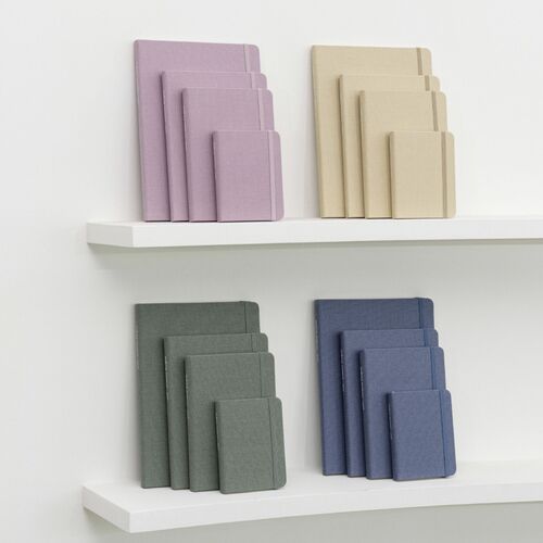 Muted Pink planners are arranged in two groups, displaying the same cover color across different sizes.