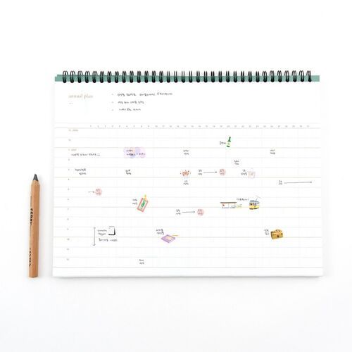 The annual plan page uses a horizontal timeline with month labels, giving you room to map projects and important dates.