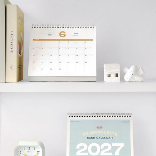 A June calendar page fills the frame with handwritten notes and colorful accents inside the spacious monthly grid.