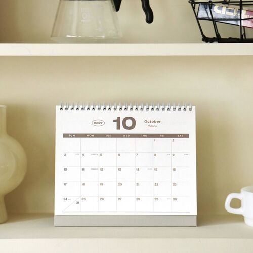 September is shown in both desk and wall-style presentations, with a large lavender month number and simple date grid.