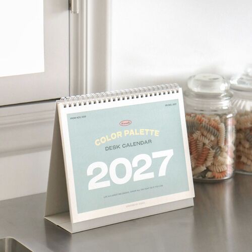 A wall-style display and desk calendar are pictured together, contrasting the tall calendar format with the freestanding desk version.
