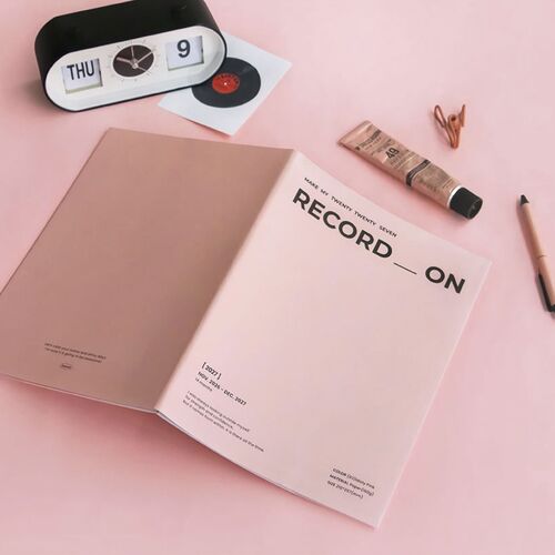 A close tabletop view highlights the Butter cover, bold Record On lettering, and printed 2027 date range.