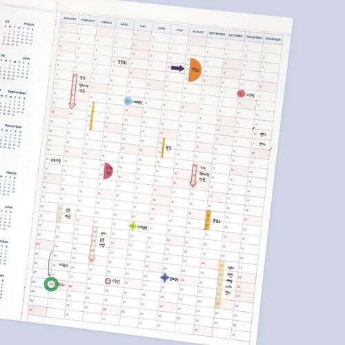 A year-at-a-glance layout displays 2027 and 2028 reference calendars alongside the planner’s monthly section.