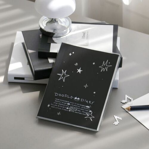 Monthly calendar pages feature colorful accents, illustrated icons, and generous open areas for recording plans.