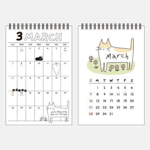 Photo 4: March is displayed with a cat among flowers, pairing a roomy monthly grid with a smaller reference calendar.