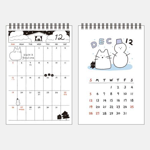 Photo 7: The December page uses a winter scene with a cat and snowman above a spacious calendar grid.