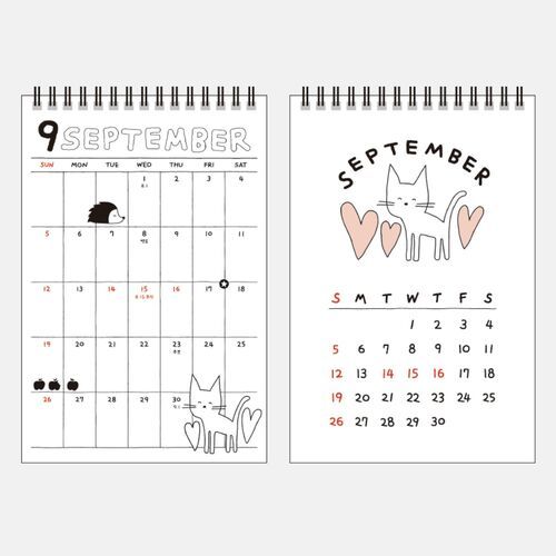 Photo 6: September combines cat illustrations and heart shapes with a clear monthly layout and red Sunday dates.
