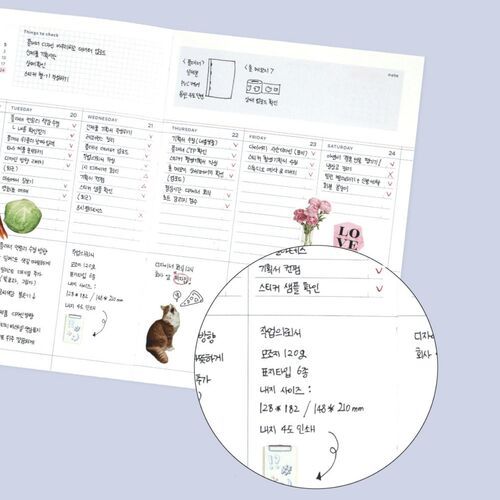 Decorative stickers and handwritten notes demonstrate how the monthly layout can hold appointments and reminders.