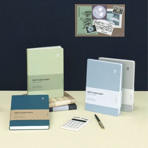 A stationery arrangement presents Teal Blue, Pistachio, Navy, Beige, and Light Gray covers together for easy color comparison.