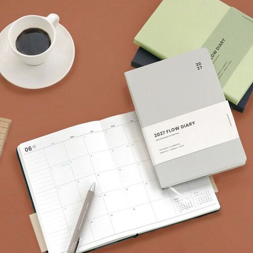 A weekly spread shows dated day sections alongside a lined notes area for reminders and written details.