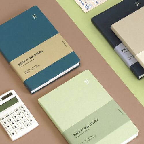Several planners are styled with desk accessories, showing how the layouts support work organization and everyday scheduling.