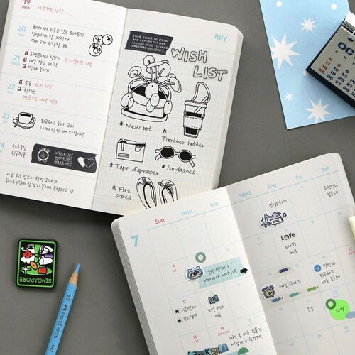 Brew Time is centered among writing tools, with its green coffee illustration facing upward.